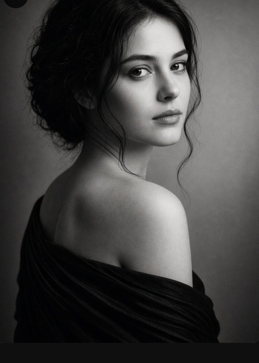 A cinematic, professional black-and-white studio portrait of a woman with an elegant, c...